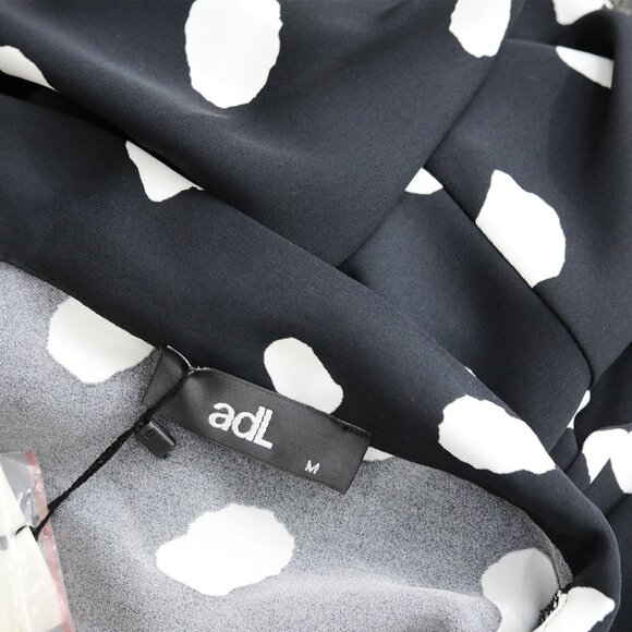 Elegant Tie-Neck Black & White Polka Dot Mini Dress - Picture 3 of 5